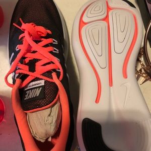 Brand new pair of Nikes black and orange